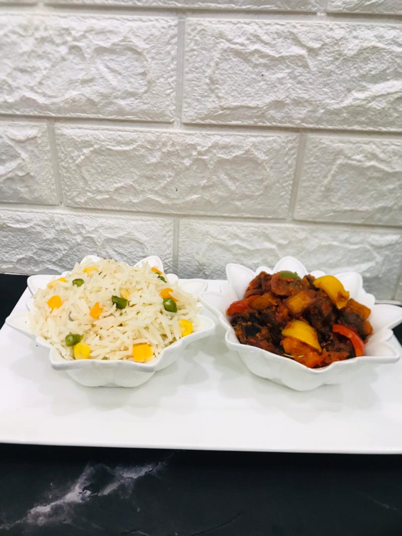 Product 5: Plate of white rice along side stew